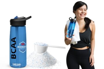Image of woman drinking a BCAA muscle recovery drink after a workout